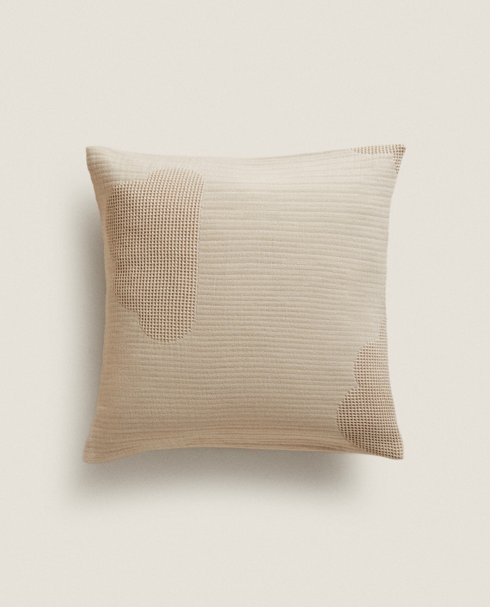 A closeup of a plain cushion